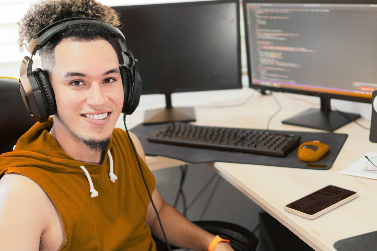 Young software developer working at home.